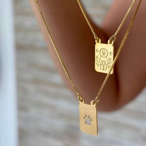 Escapulário São Francisco de Assis e patinha vazada folheado em ouro 18K